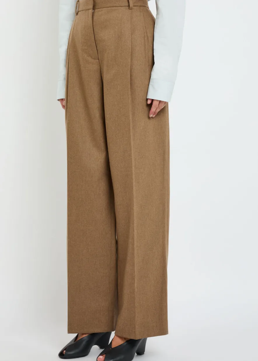 August pleated wool-blend trousers