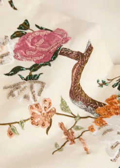 Beautiful floral-embroidered flared-leg jeans