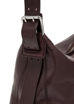 Belted baguette leather shoulder bag
