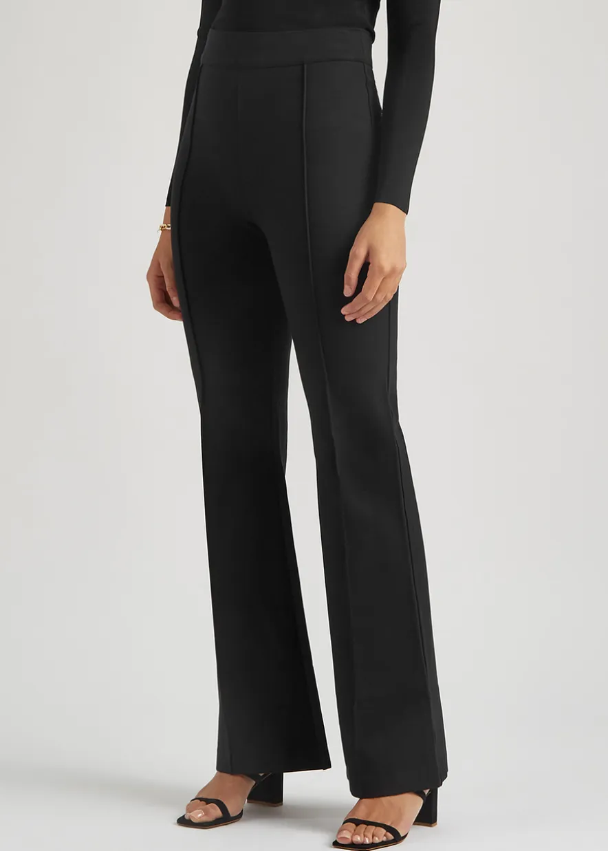 Black stretch-jersey flared-leg trousers