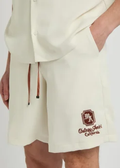 Chateau appliquéd woven shorts