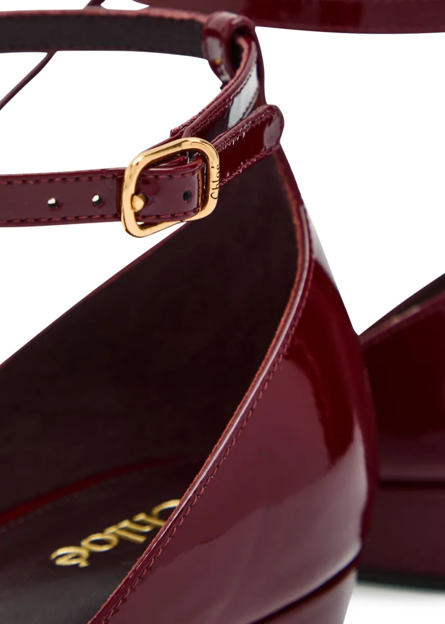 Cleia stud-embellished patent leather sandals
