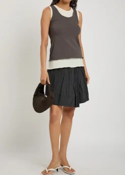 Crinkled cotton-blend mini wrap skirt