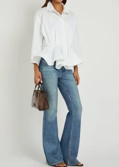 Dahlia denim-print flared-leg trousers