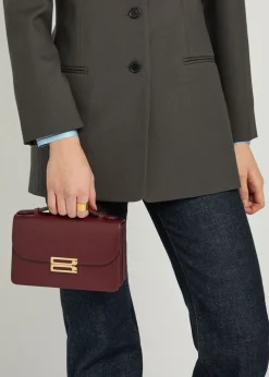 Dorian mini grained-leather top handle bag