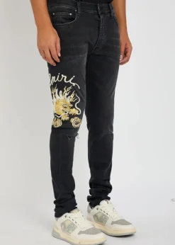 Dragon Repair embroidered slim-leg jeans