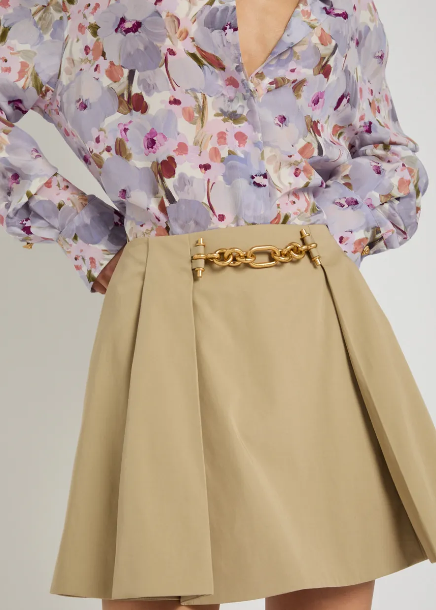 Embellished pleated cotton mini skirt