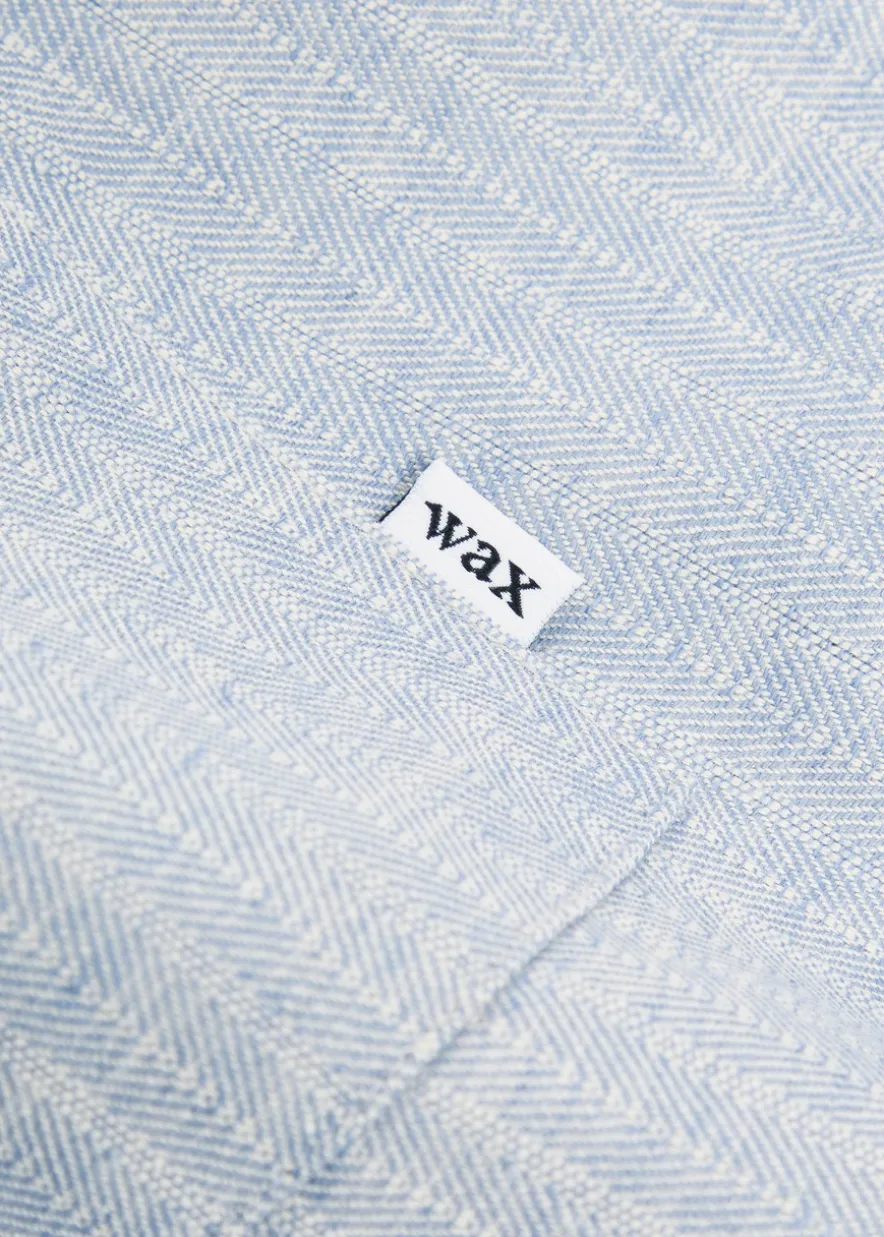 Kurt striped cotton and linen-blend shorts