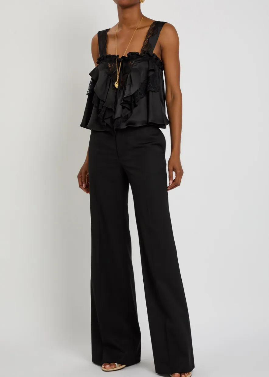 Lace-embellished ruffled silk blouse