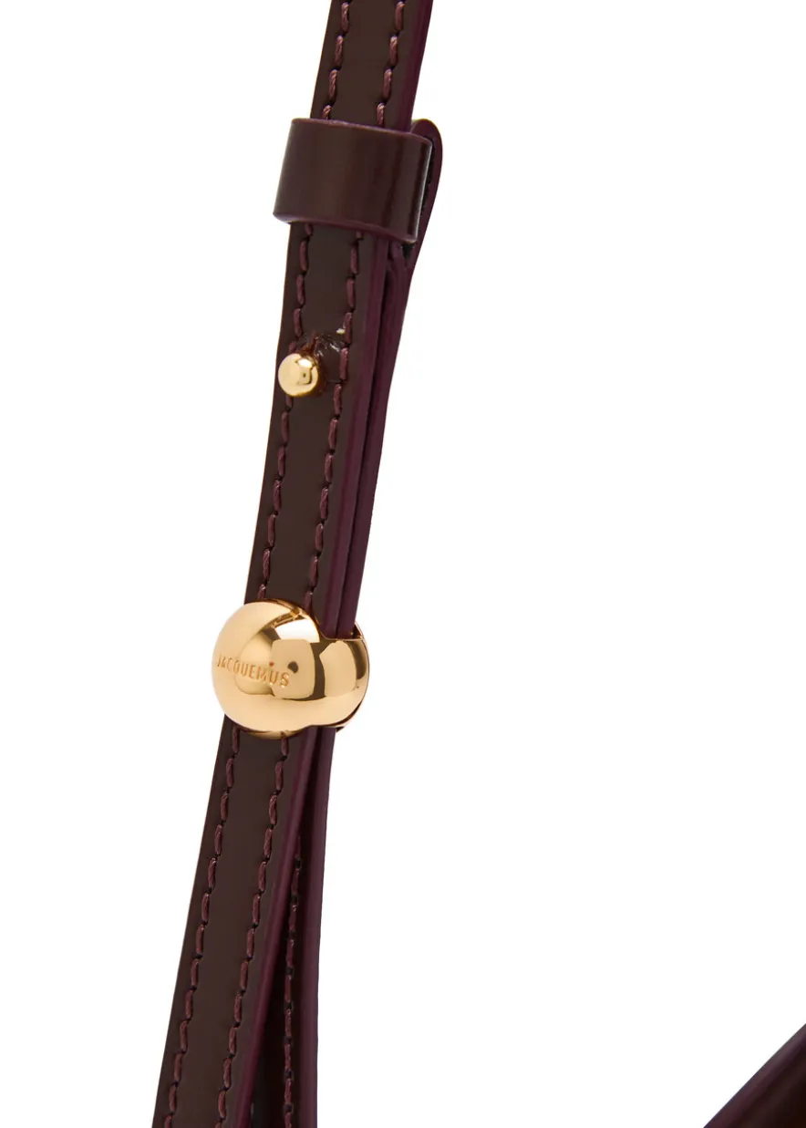 Le Petit Bisou glossed leather shoulder bag