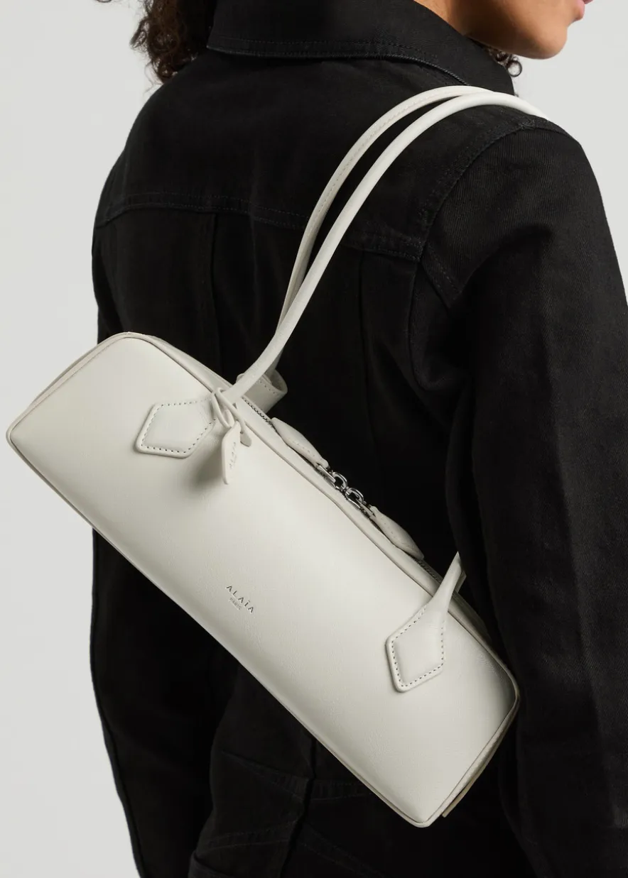 Le Teckel medium grained leather shoulder bag