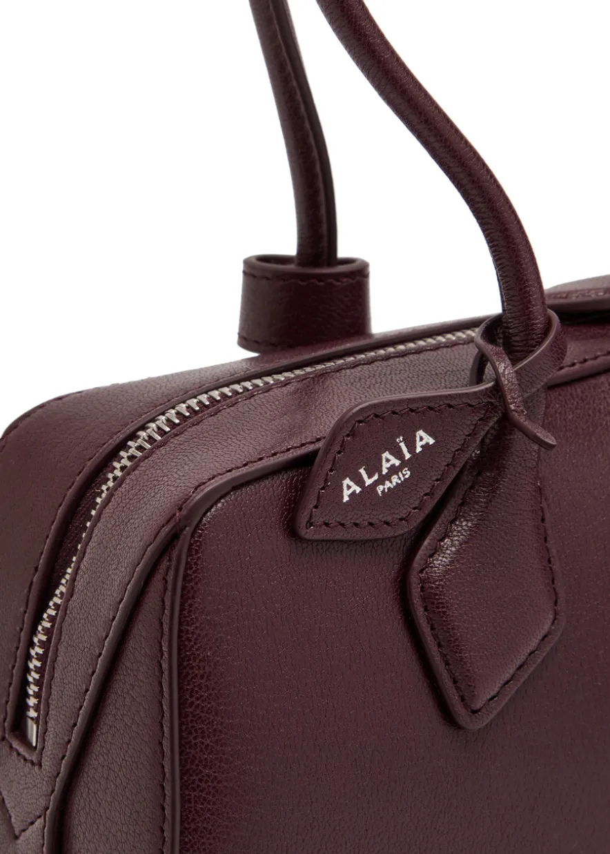 Le Teckel medium grained leather shoulder bag
