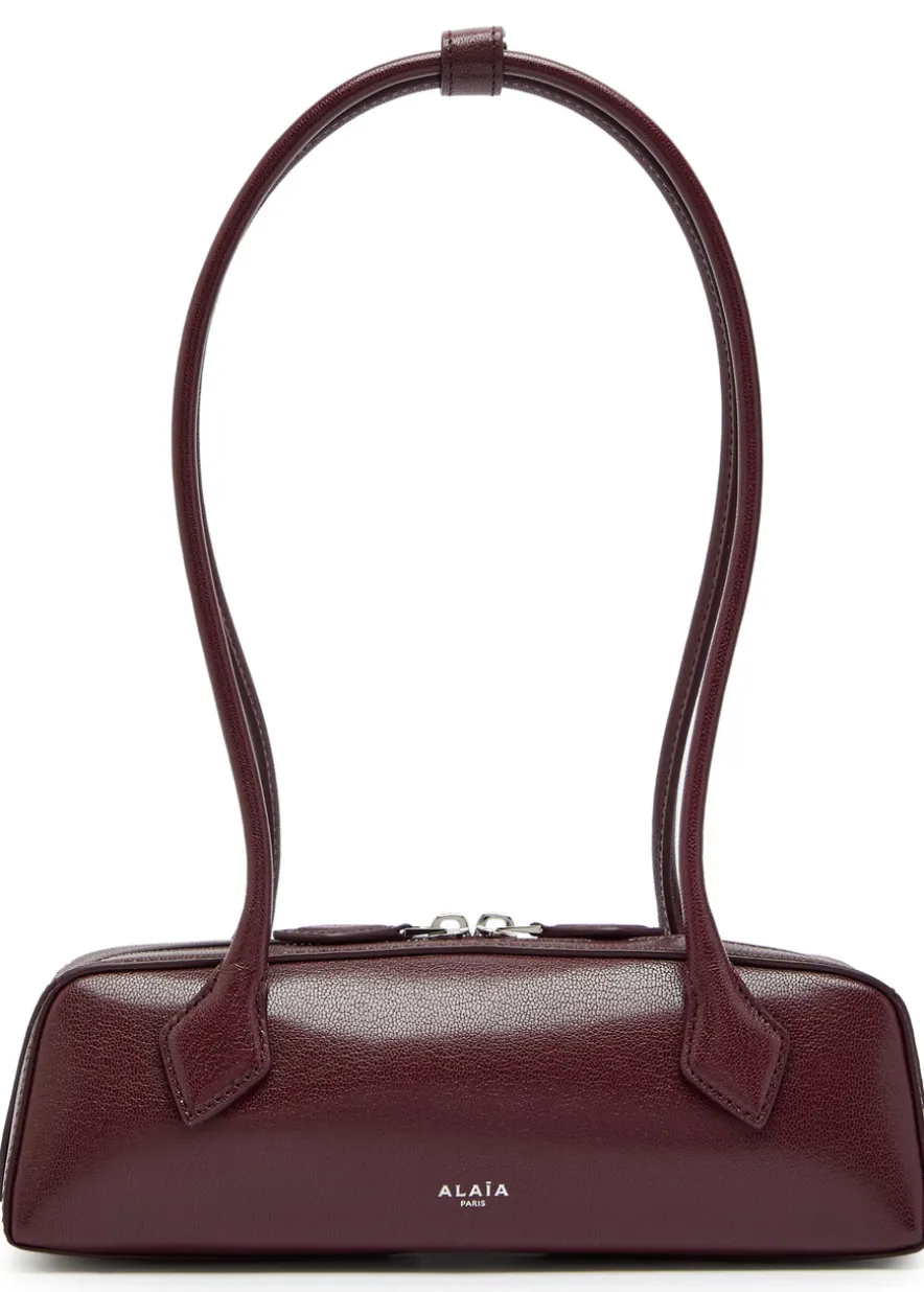 Le Teckel small grained leather shoulder bag