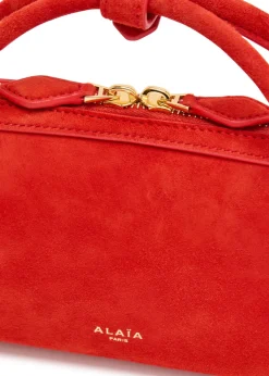 Le Teckel suede clutch