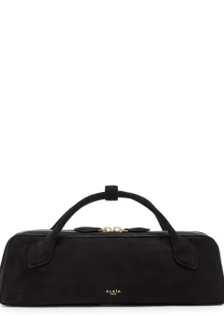 Le Teckel suede clutch