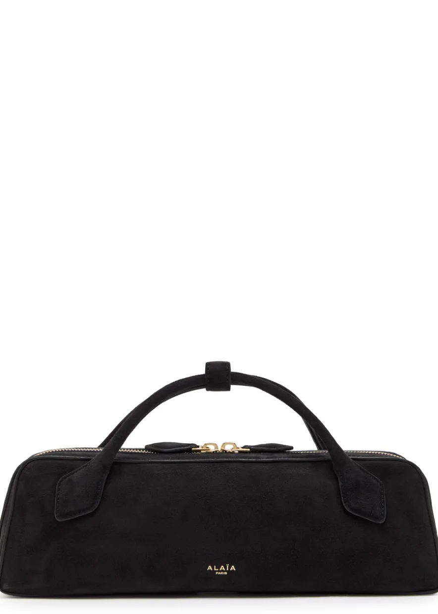 Le Teckel suede clutch