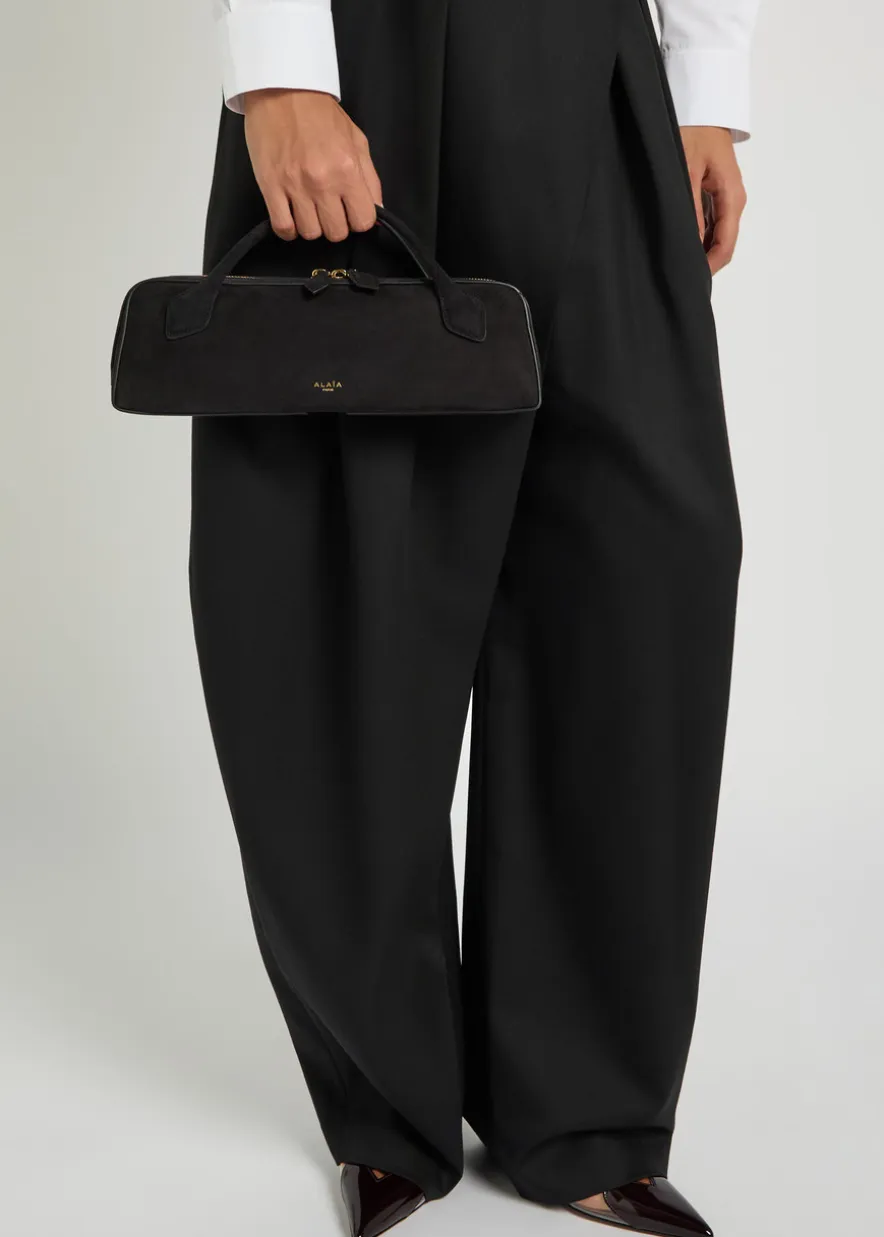Le Teckel suede clutch