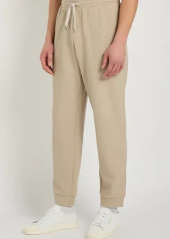 Logo-appliquéd piqué cotton-blend sweatpants