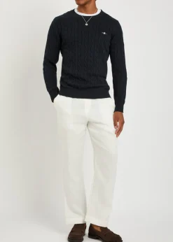 Logo-embroidered cable-knit cotton jumper