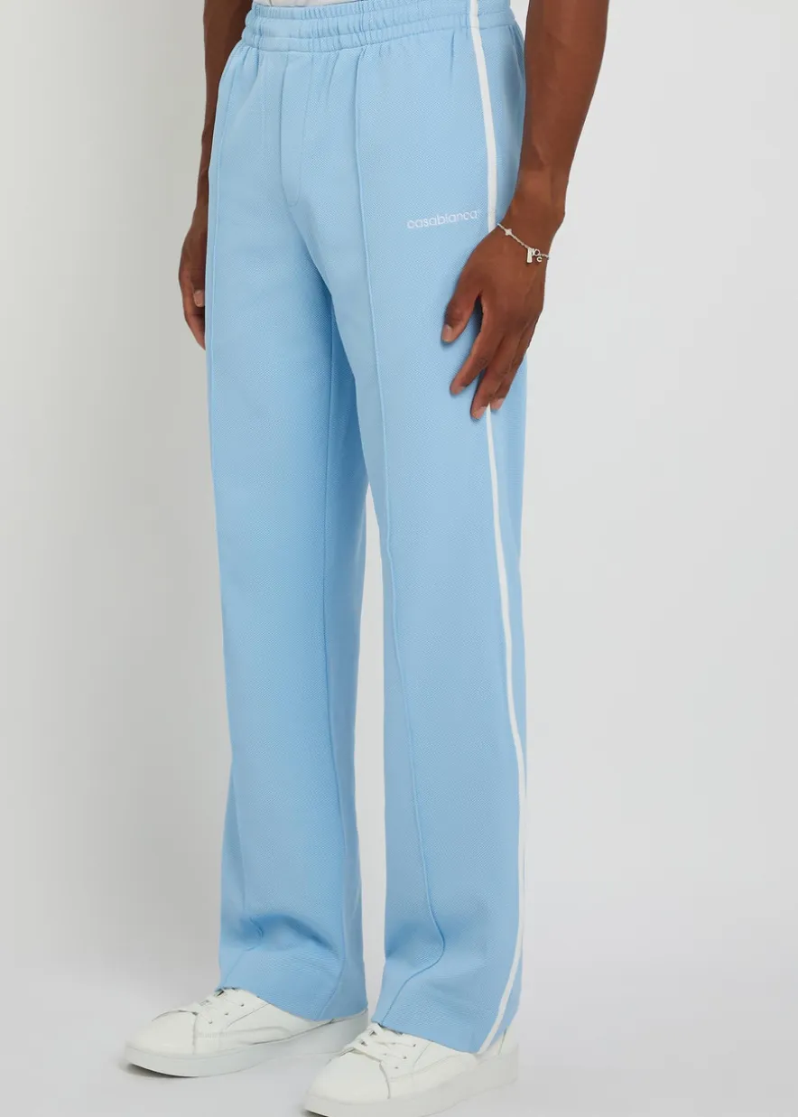 Logo-embroidered piqué woven track pants