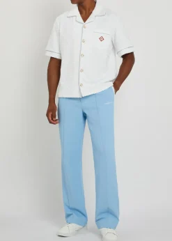 Logo-embroidered piqué woven track pants