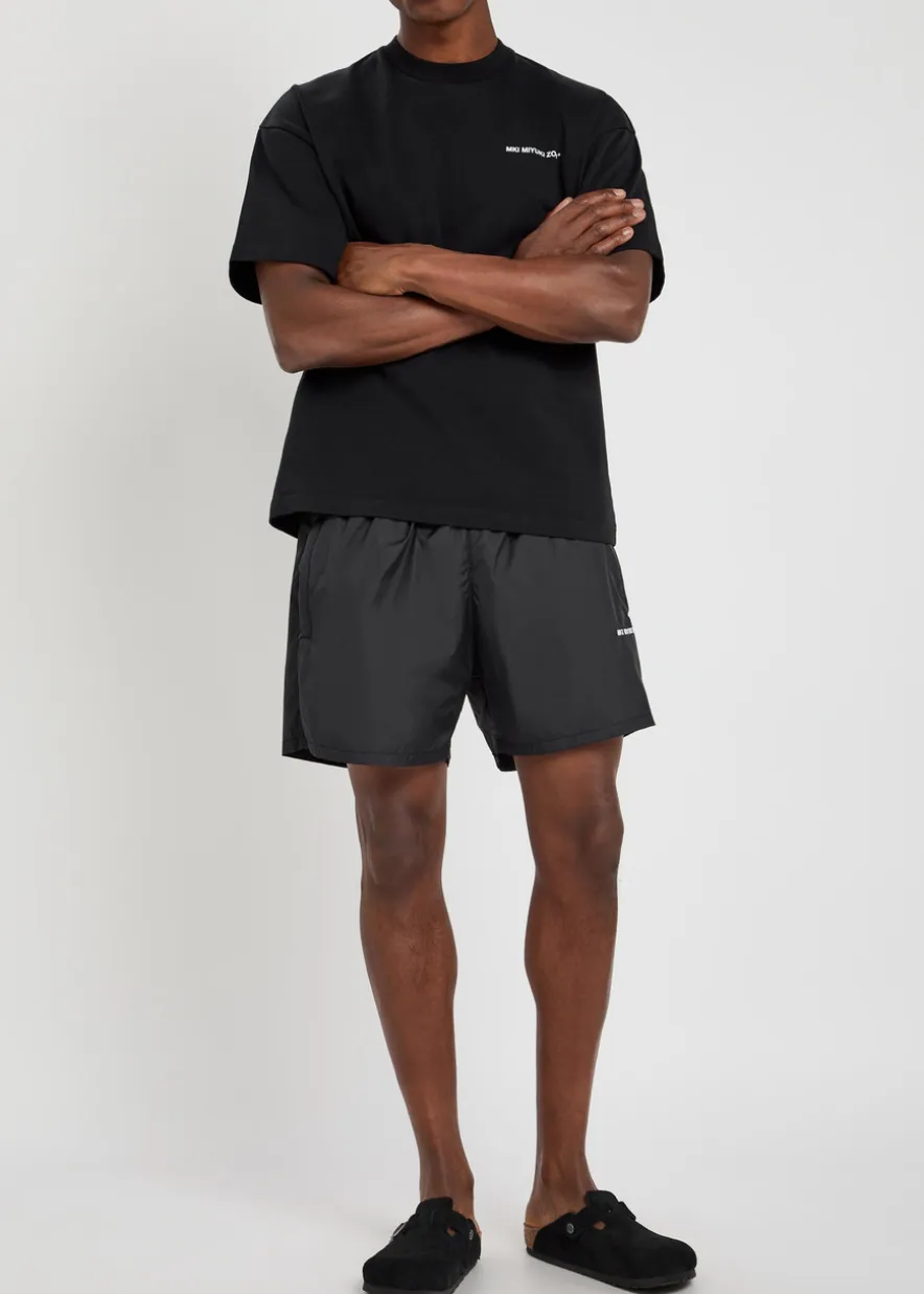 Logo-embroidered swim shorts