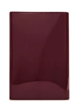 Logo-stamped patent leather passport holder