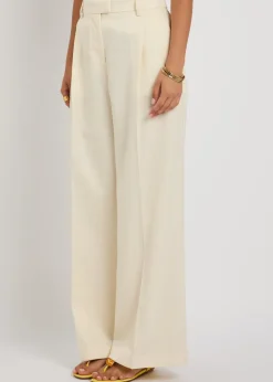 Loose pleated wide-leg wool trousers
