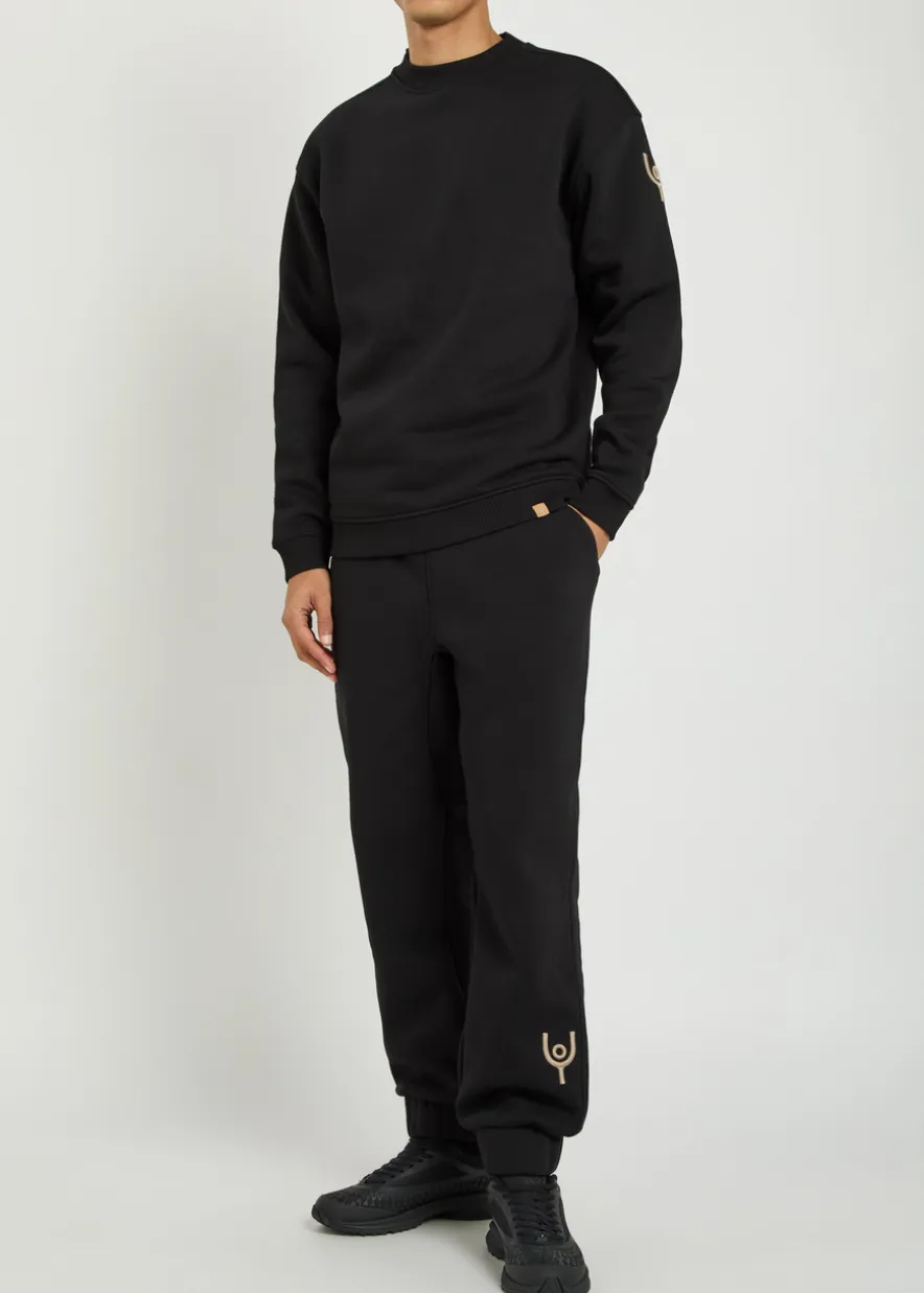 Magna logo-embroidered cotton-blend sweatpants
