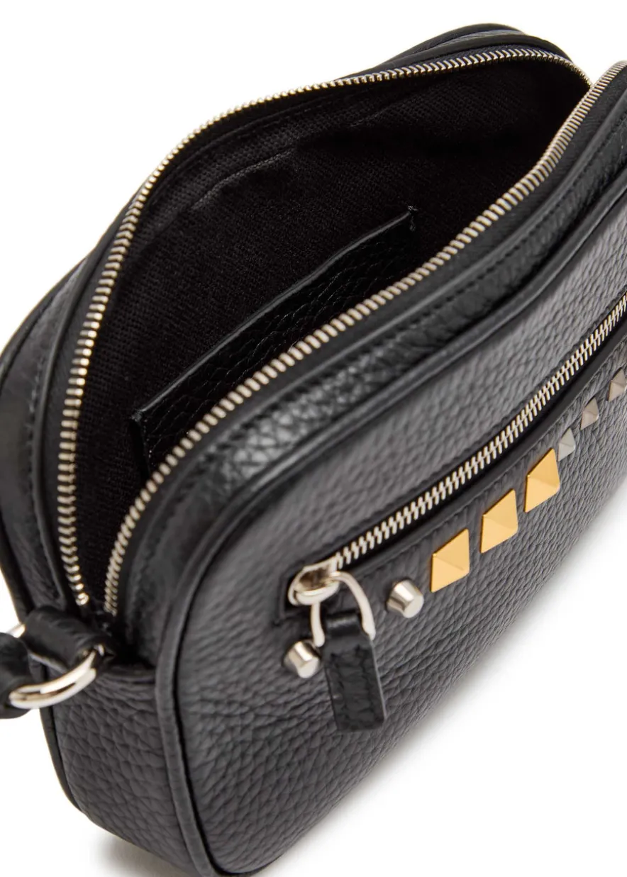 Mini stud-embellished grained leather cross-body bag