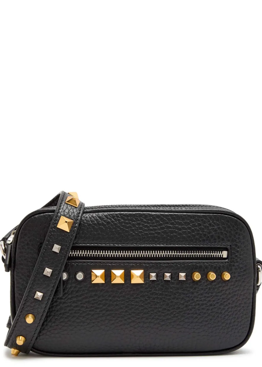 Mini stud-embellished grained leather cross-body bag