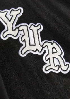 OG logo-appliquéd panelled cotton hockey jersey top
