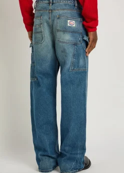 Paint-effect washed wide-leg jeans
