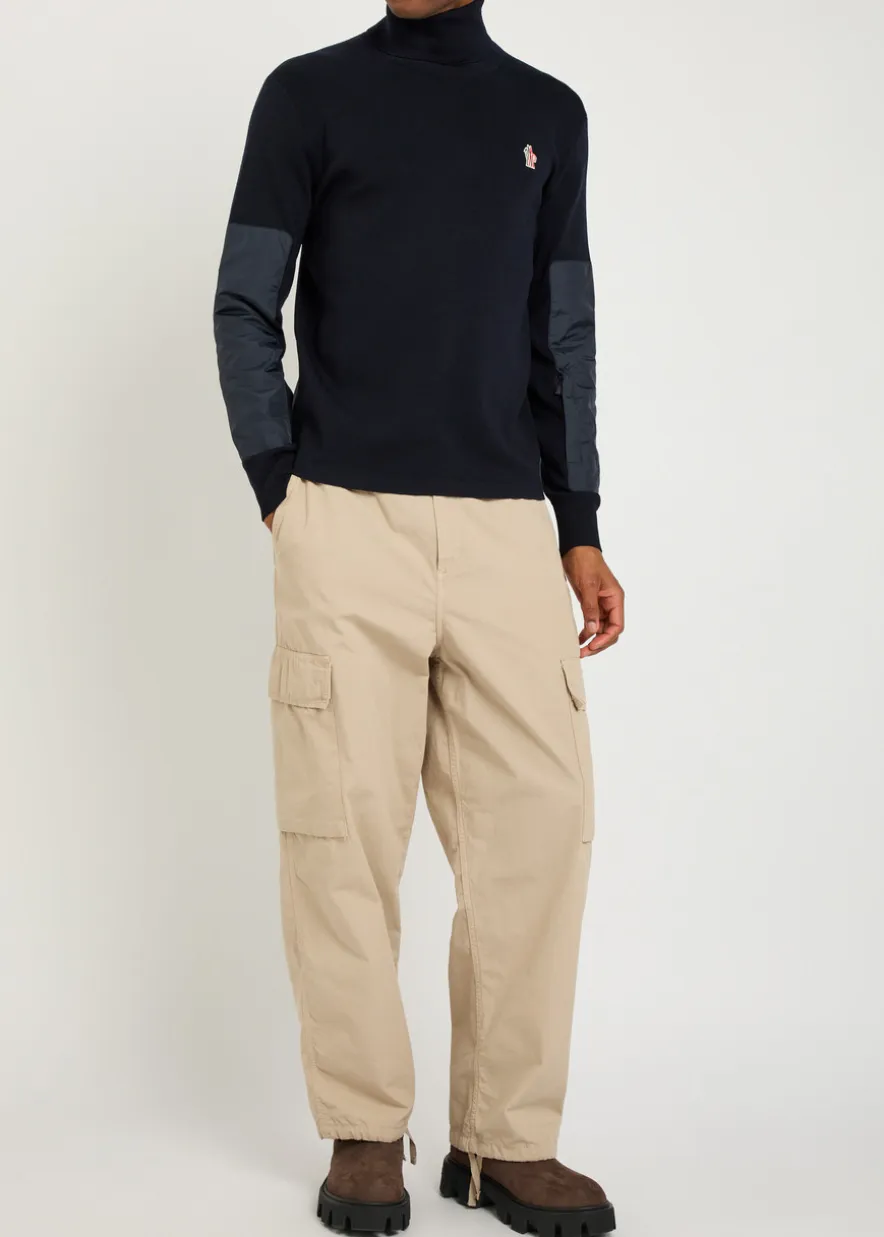 Panelled roll-neck wool-blend jumper