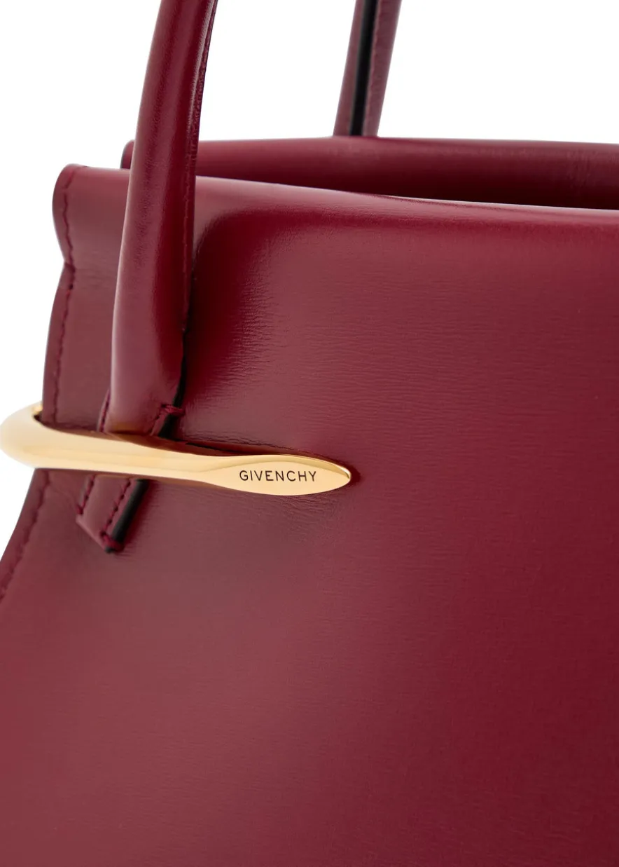 Pinch medium leather top handle bag