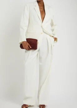 Pleated high-rise wool-blend trousers