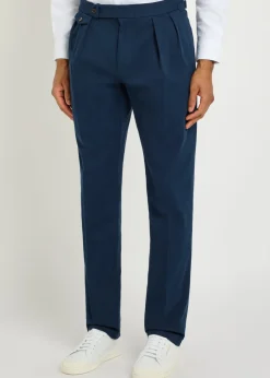 Pleated tapered-leg stretch-cotton trousers