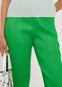 Pleated tapered-leg woven trousers