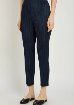 Pleated tapered-leg woven trousers