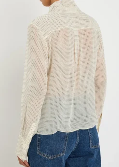 Polka-dot tie-neck silk blouse