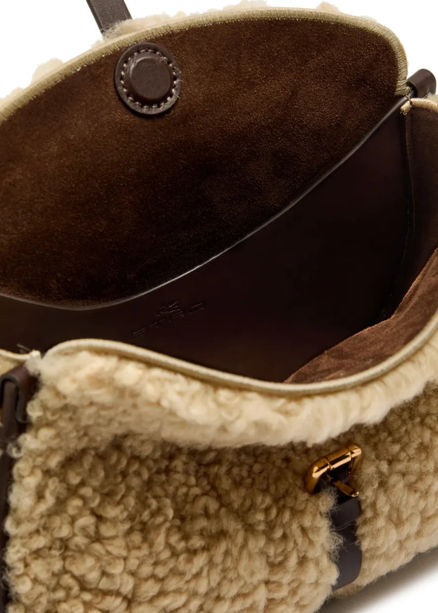 Pony shearling cross-body bag