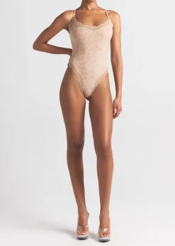 Printed lace-trim stretch-jersey bodysuit