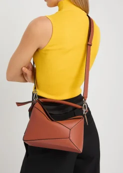Puzzle Edge small leather top handle bag