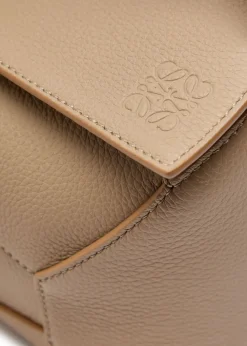 Puzzle Edge small leather top handle bag