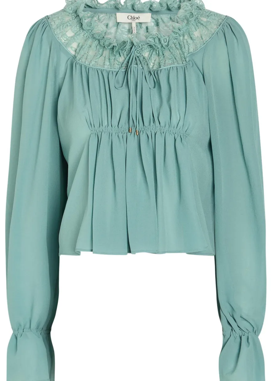 Ruffled lace-trim silk blouse