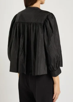 Ruffled shell blouse