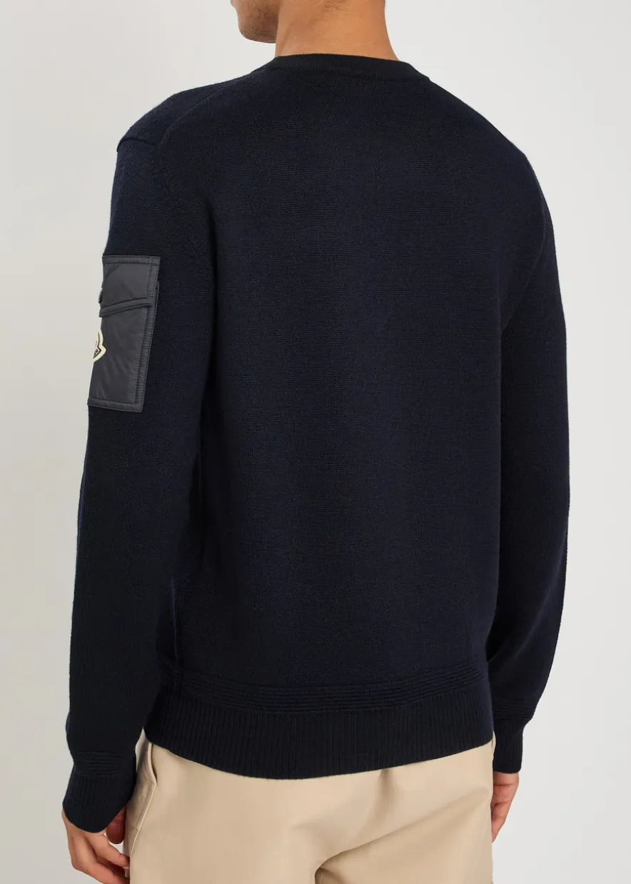 Sleeve-pocket wool jumper
