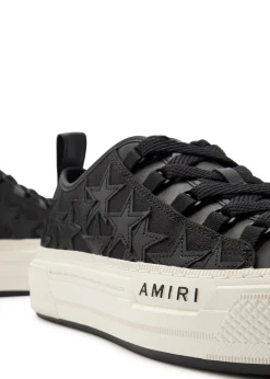 Stars appliquéd leather and canvas sneakers