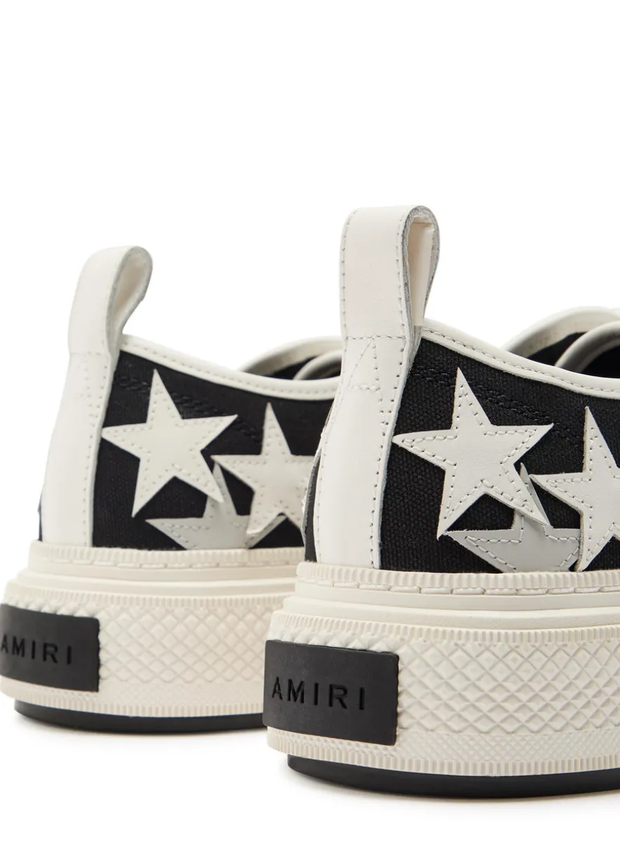 Stars appliquéd leather and canvas sneakers