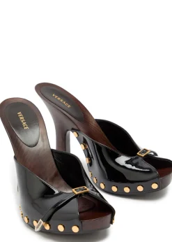 105 stud-embellished wooden and patent leather mules